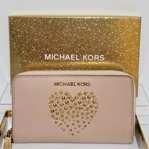 Michael kors giftables studded heart phone case wallet.